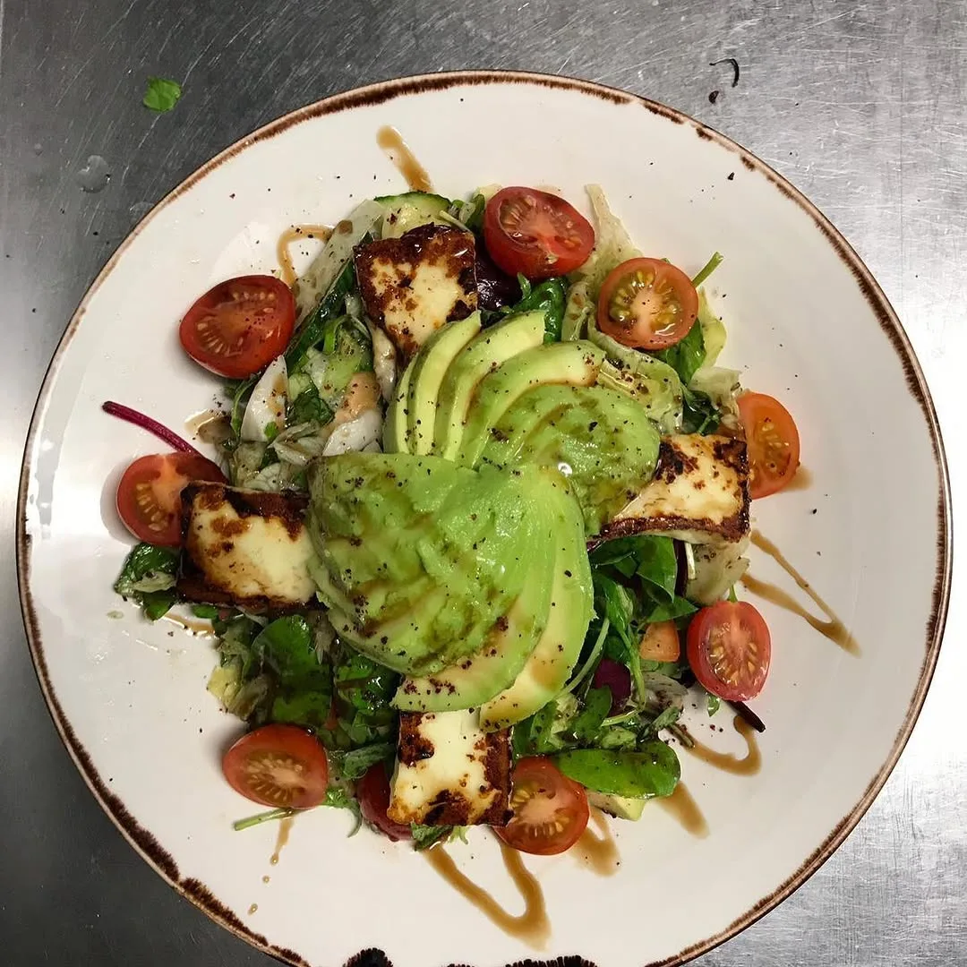 Avocado and halloumi salad at Frida Camden — fresh Mexican brunch starter in Camden London
